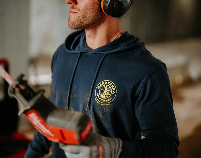 Man wearing a Hard Yakka Heritage Icon hoodie.